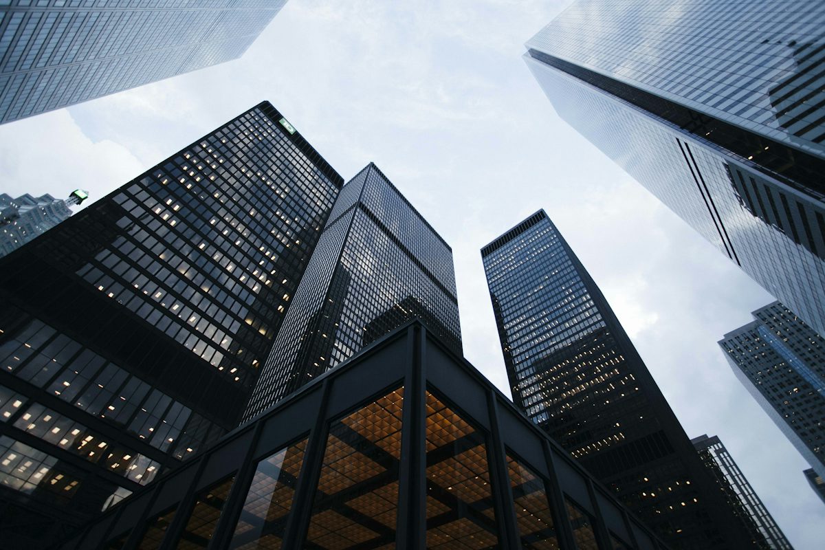 low angle photo of city high rise buildings during daytime — illustrative stock photo