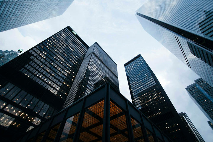 low angle photo of city high rise buildings during daytime — illustrative stock photo