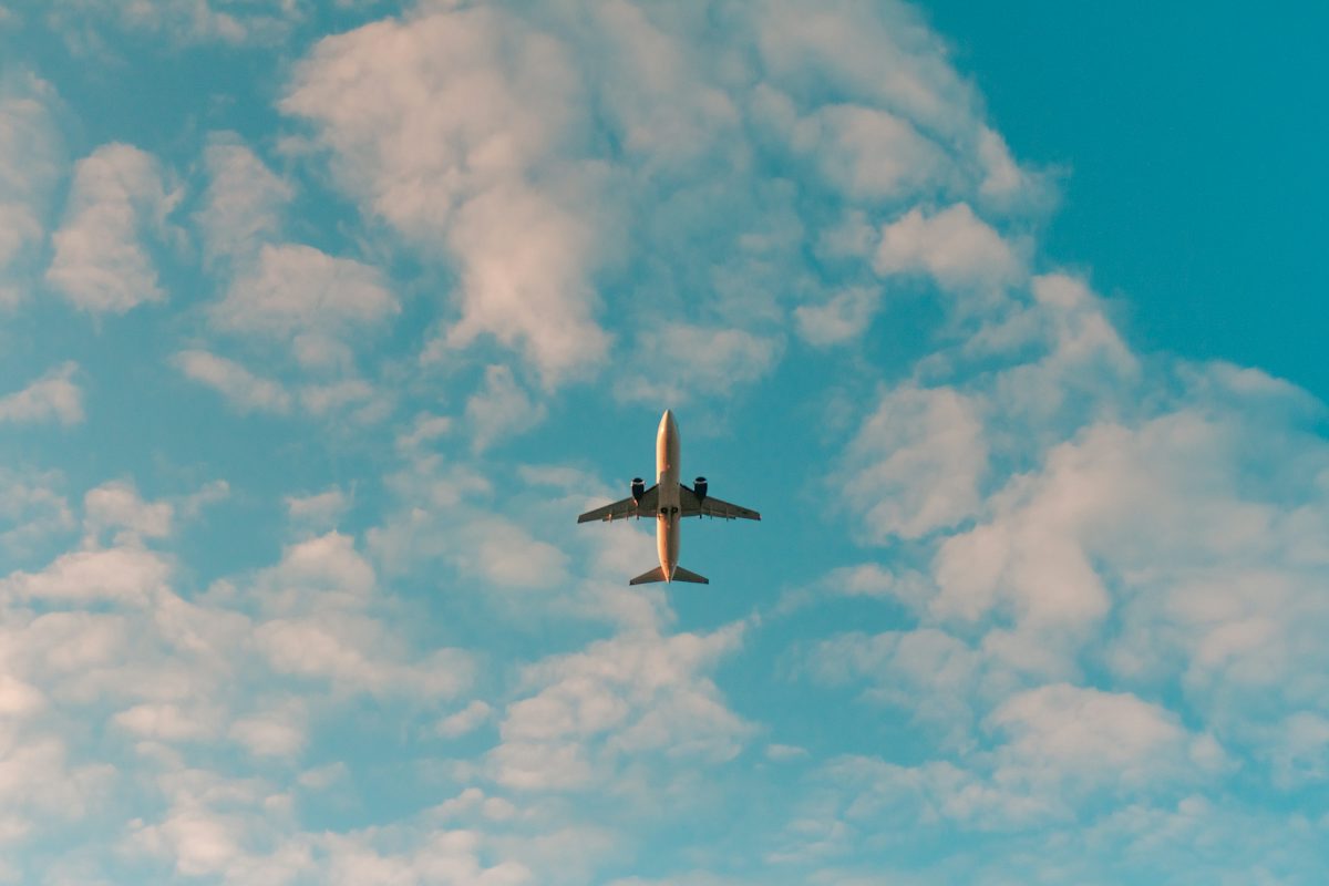 white airplane flying in the sky during daytime — illustrative stock photo