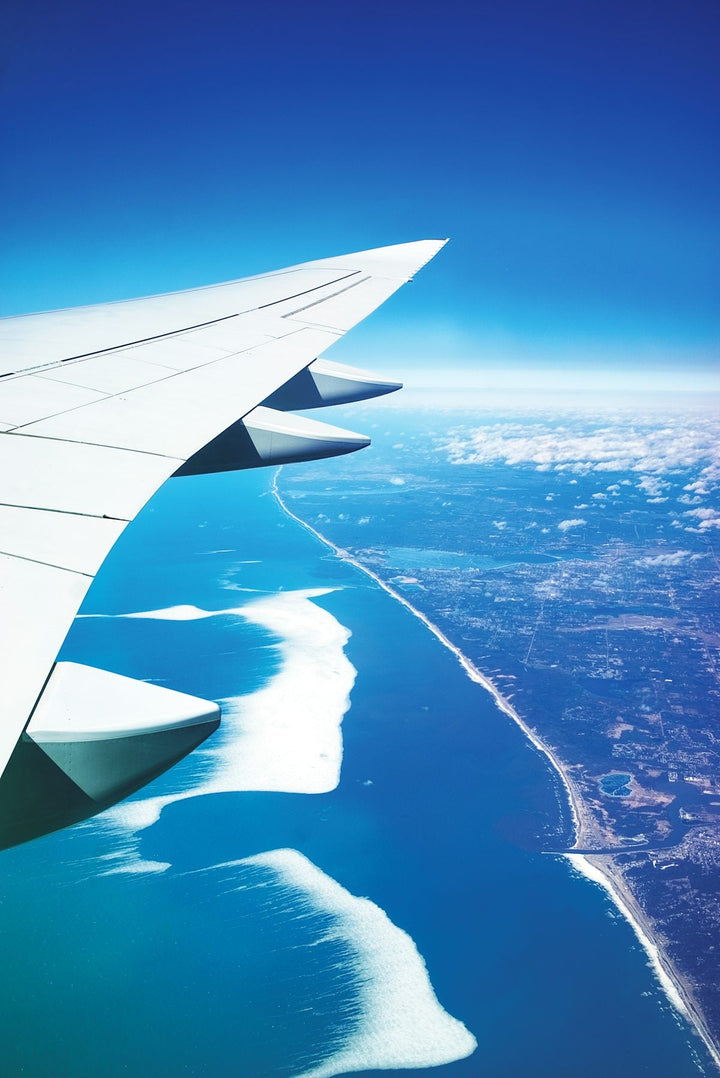 aerial photo of airplane wings during daytime — illustrative stock photo